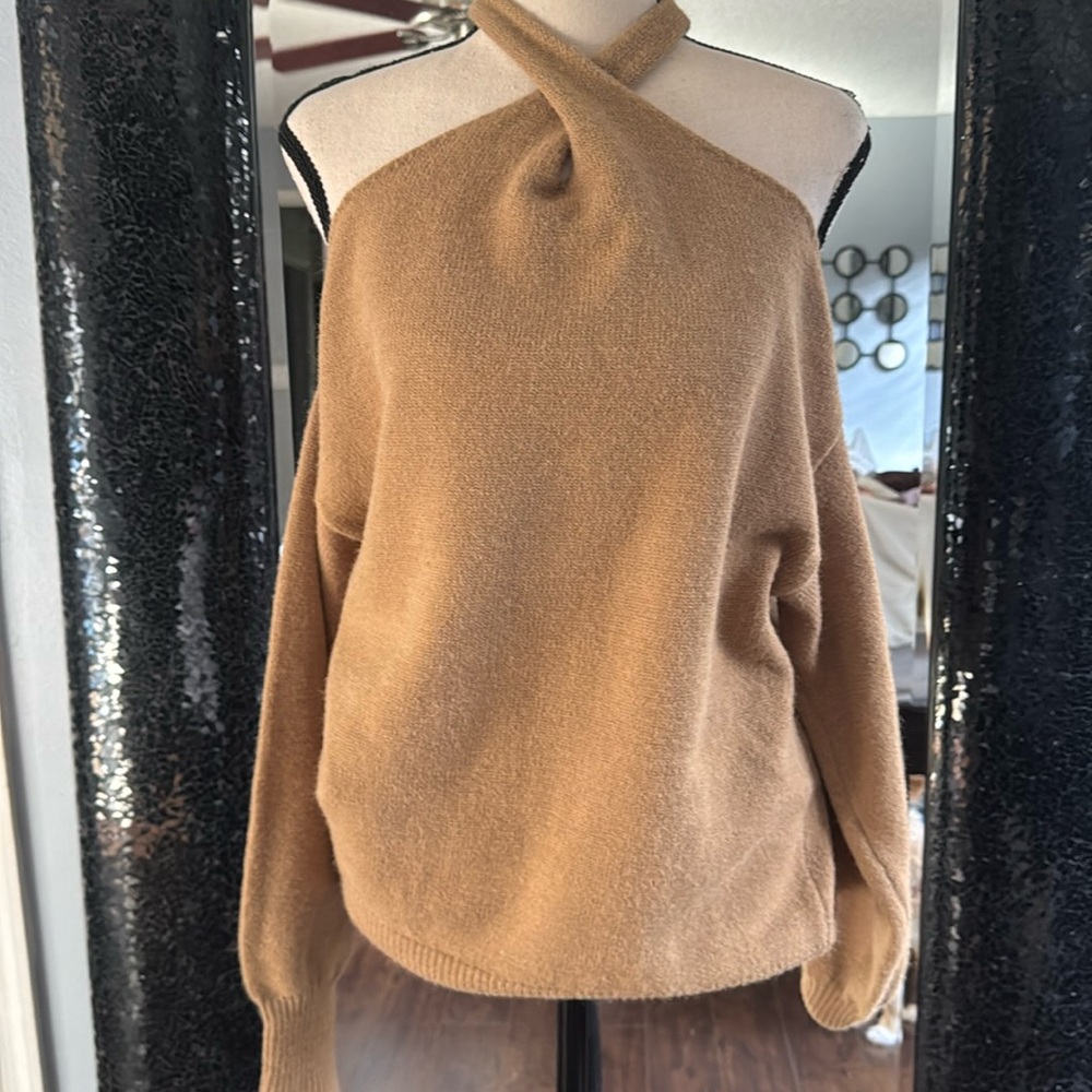 Soft cold shoulder, cross neck sweater, stunning 🤎